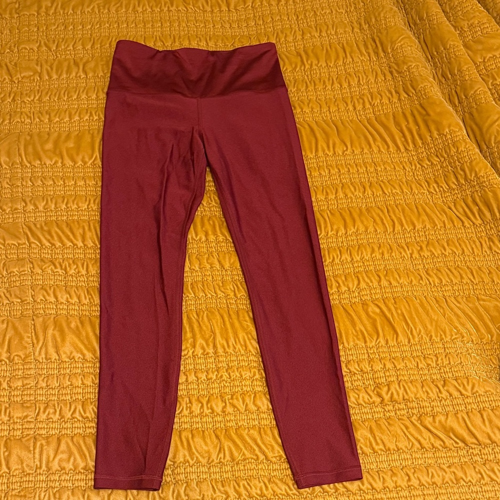 Shiny red leggings